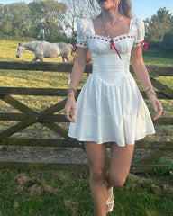 White Puff Sleeve Red Ribbon Lace Up Mini Dress